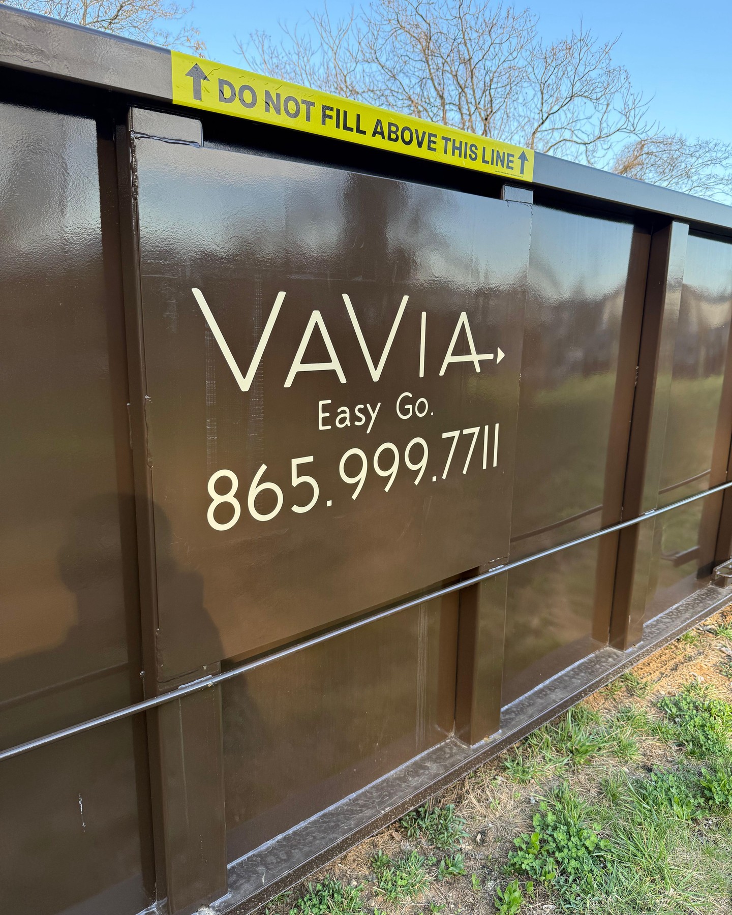 Walk-in dumpsters. Drivew